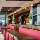 Unternehmen 7 Bild MÖVENPICK CAFÉ FLUGHAFEN BERLIN BRANDENBURG Restaurant & Café am Schönefeld BB